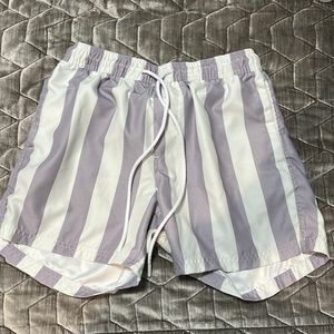 purple and white striped shorts